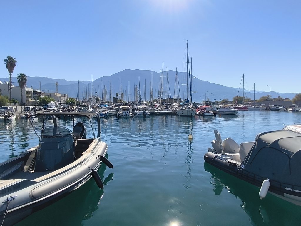 Kalamata Marina with boats and Mount Taygetos in the background