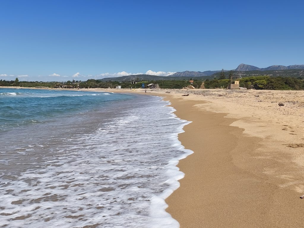 The sandy shore of Lagouvardos Beach in Messinia