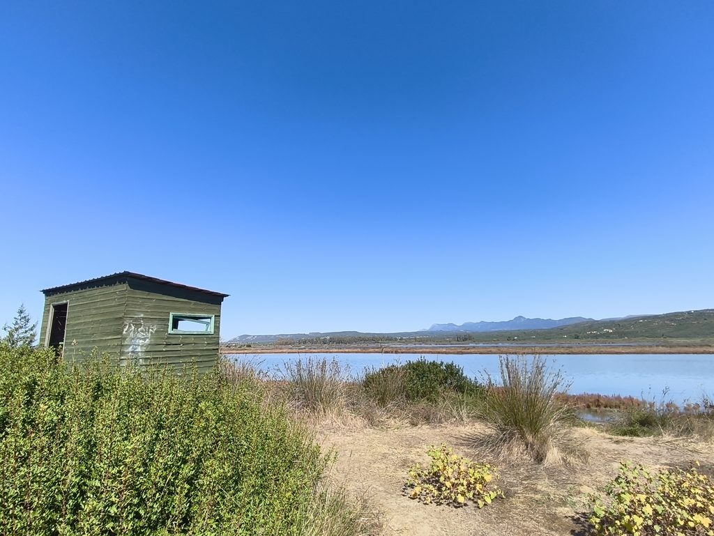Wooden birdwatching hide overlooking Gialova Lagoon in Messinia, Greece.