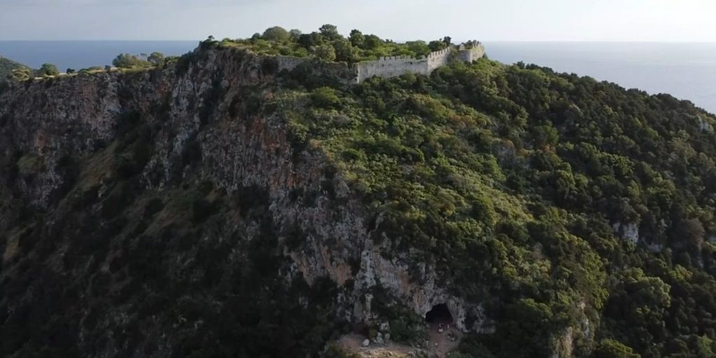 Steep hillside below Palaiokastro Castle with Nestor's Cave.